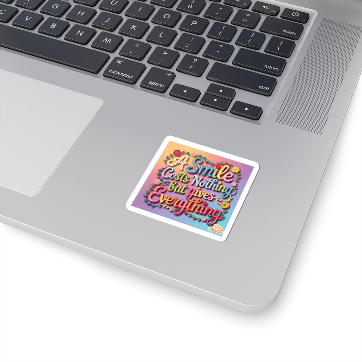 Sticker — "A Smile Costs Nothing But Gives Everything" Colorful Inspirational Kiss-Cut Sticker